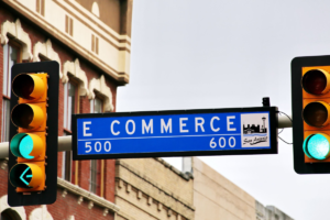 Blue E Commerce street sign in San Antonia Texas